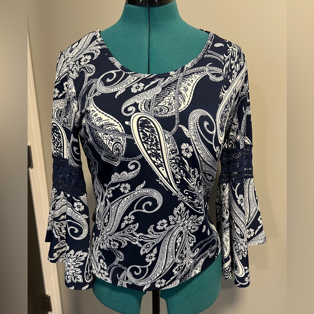 Ladies lace and flare sleeve top